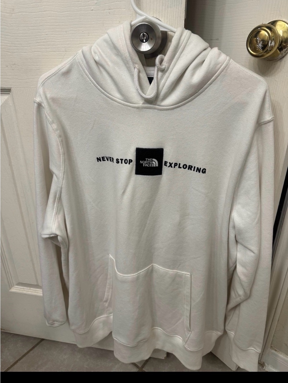 The North Face White "Never Stop Exploring" Hoodie
